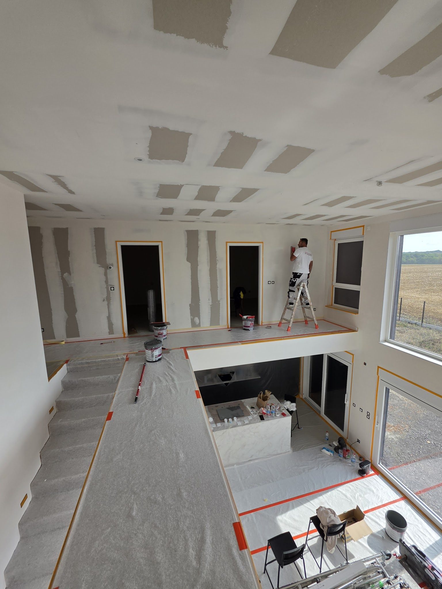 Chantier de plâtrerie sur une mezzanine
